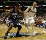 Dallas Mavericks guard Kidd looks for room to drive against Memphis Grizzlies guard Conley in the NBA basketball game in&nbsp;Dallas